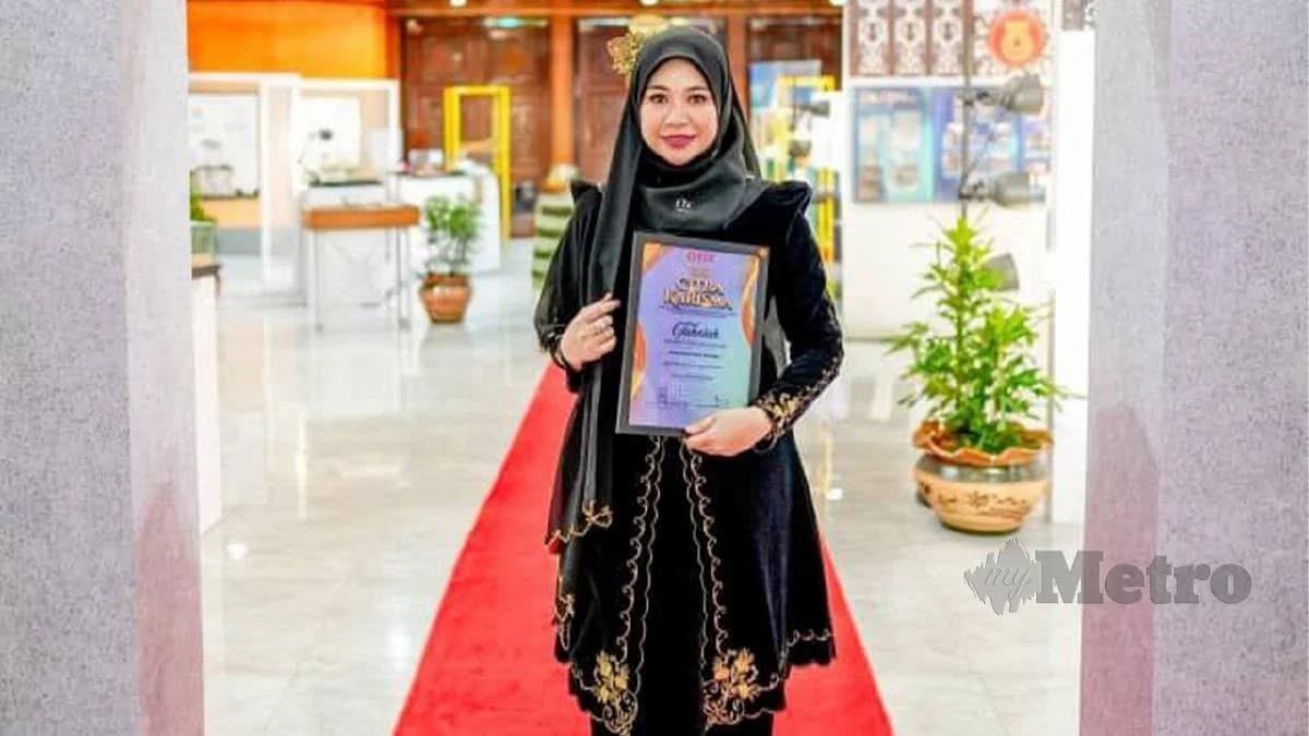 Dr Norliyana, wanita bergelar PhD yang masih berkhidmat sebagai pembantu setiausaha pejabat - simbol semangat dan realiti susah dapat kerja.